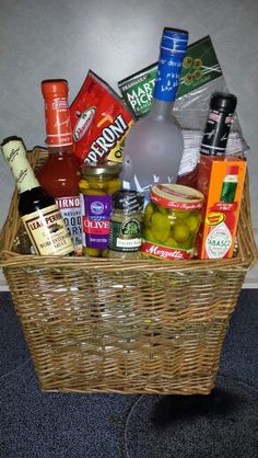 a basket filled with lots of food and condiments