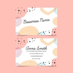 two business cards with abstract shapes on pink and yellow background, one is for the photographer