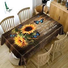 sunflowers and butterflies on a wooden table