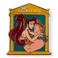 a pin with the image of a woman holding a man in her arms and 25 years written on it