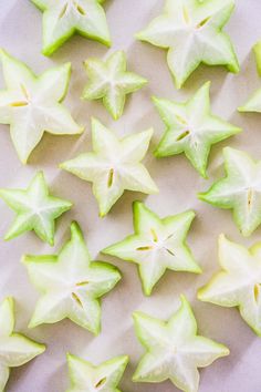 green and white star shaped cookies on a table