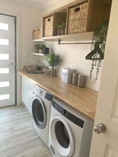 a washer and dryer in a small room