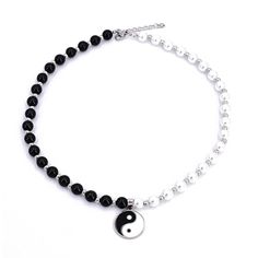 PRICES MAY VARY. Personalize men's necklaces.Stainless steel pendant,faux pearl choker necklace.Hypoallergenic, Free of lead and nickle, high polished and durable. Chain length about 50cm + 5cm / 19.7in + 1.97in.Weight about 40g.Both fit for men and women. Fashion bead necklace jewelry for men and women.Special black and white color beads.Yin and Yang the Eight Diagrams is an ancient culture. Those who wear yin yang jewelry are brought not only positive energy but also good fortune and luck. Pea Adjustable Black Necklace For Streetwear, Ying Yang Necklace, Yin Yang Jewelry, Galaxy Necklace, Lucky Jewelry, Black Pearl Necklace, White Moon, Fashion Beads, Best Friend Jewelry