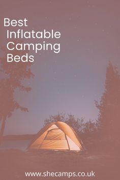 a tent with the words best inflatable camping beds on it and trees at night