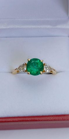 2.5 carat Zambian Round Cut Emerald with Si g to h Pear Cut Diamonds in 18k Yellow Gold Certified.  Very rare to find EXCELLENT quality round cut Zambian Emeralds.  There is much wastage on round cut gemstones, so it is far more common to see other gemstone cuts. Simply contact us for a price.  Prices vary dependent on the following: gemstone/s used metal used (sterling silver or gold) carat weight If Tanzanite, the grade used If Diamonds, the grade used   In the first instance, please contact u Green Diamond Emerald Ring Pear-shaped, Green Round Cut Emerald Gemstones, Green Pear-shaped Emerald Gemstone Ring, Pear-shaped Emerald Ring In 14k Gold, Fine Jewelry Emerald Crystal Ring, Round Cut, Pear Cut Diamond, Zambian Emerald, Pear Cut, Birmingham