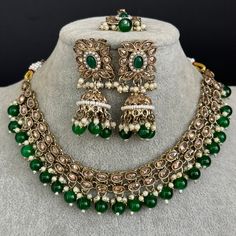 Green Antique Polki Kundan necklace set/Reverse Ad Necklace/Statement necklace/Indian/Punjabi Necklace/Pakistani Jewelry/Bridal necklace/ Antique Reverse Ad Stone Necklace With Mehndi Plating Regular Size And Adjustable Ships from California in 1 day and delivery in 2-5 business day in the USA   This is 100% Handmade jewelry. So Color, shades, texture displayed may slightly vary from the actual product due to digital image limitations. We request you to consider these minor variations. Please expect the possibility of some slight imperfections when buying hand made jewelry. If you have any questions, please message or email us. Arrives in gift box. Please let me know if you have any questions. Thank you so much visiting my shop.Regular Size And Adjustable Bollywood Style Hand Set Necklace For Eid, Green Chandbali Bridal Necklace For Eid, Heavy Chandbali Necklaces For Eid, Heavy Necklaces For Eid Celebration, Green Jewelry For Wedding On Eid, Green Jewelry For Wedding And Eid, Bollywood Style Necklaces For Eid, Bollywood Style Bridal Necklace For Eid Gift, Heavy Necklace For Eid Celebration