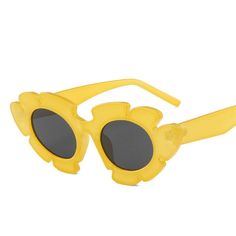 Look chic and eye-catching with the Vintage Flower Cat Eye Sunglasses. Featuring an alluring cut-out flower design and + more colors to choose from, these stylish sunglasses will add vibrancy and elegance to your look. Yellow Plastic Sunglasses For Summer, Yellow Sunglasses With Uv Protection For Spring, Yellow Mirrored Sunglasses For Spring, Yellow Tinted Sunglasses For Spring, Yellow Plastic Sunglasses For Party, Yellow Sunglasses With Uv Protection For Party, Yellow Cat Eye Sunglasses For Summer, Yellow Cat Eye Sunglasses For Spring, Yellow Cat Eye Sunglasses For Beach