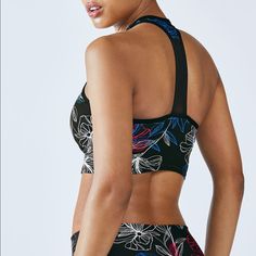 Fabletics ~ Clara Sports Bra Top~ Floral, Midi Sizes: Xs Color: Black, Pink, White, Blue -Built In Shelf Bra -T Strap Back/Racer Back - High Neck Top Condition: New With Tags! $34.95 An Update To Our Moorea Midi Bra, This Edgy Style Features A Mesh-Trim Back And Moisture-Fighting Fabric For Superior Breathability. Choose Your Support Level With Its Removable Cups Workout Top Gym Shark Athleta Nike Gym Fitness Active Reebok Athletic Alo Yoga Prana Ava Yoga Beyond Yoga Sweaty Betty Spring Athleisure Sports Bra For Workout, Spring Workout Sports Bra In Athleisure Style, Black Sports Bra With Built-in Bra For Spring, Black Seamless Sports Bra For Spring, Sports Bra With Built-in Bra For Training In Spring, Spring Training Sports Bra With Built-in Bra, Spring Training Sports Bra, Spring Black Stretch Sports Bra, Spring Sports Bra In Black