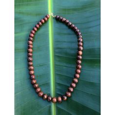 Beaded Koa Necklace with 8mm beads shows the natural beauty of this Hawaiian Wood that is so admired and popular. We have this necklace in 16 inch or 18 inch featuring a clasp closure. Material: Koa Wood Bead Size: 8mm Clasp Closing Size: 16 inches or 18 inch More about Woods of Hawaii: CLICK HERE Classic Beaded Necklaces With Round Beads, Classic Beaded Necklaces With Round Beads For Everyday, Classic Single Strand Beaded Necklaces, Classic Single Strand Beaded Necklace For Everyday, Everyday Natural-toned Round Bead Jewelry, Brown Single Strand Necklace With Round Beads, Classic Adjustable Necklace With 8mm Beads, Natural Colored 8mm Beaded Jewelry For Gifts, Natural Color Jewelry With 8mm Beads For Gifts