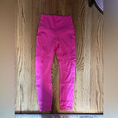 Size 4 Sonic Pink Brand New Never Worn Functional Pink Activewear With Pockets, Pink Activewear With Pockets For Workout, Pink Workout Activewear With Pockets, Pink Sports Leggings With Pockets, Pink Athleisure Leggings With Pockets, Pink Activewear With Pockets For Yoga, Pink Yoga Activewear With Pockets, High Waist Pink Activewear With Pockets, Lululemon Align