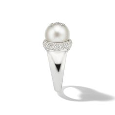 A single white South Sea pearl is inlaid with white diamonds, using a patented process developed for Wilfredo Rosado, in your choice of letter or symbol. The pearl is then set in a white diamond pavé bezel atop a white gold band. Due to the hand craftsmanship of this item, please allow 4-6 weeks for delivery. Made in Italy 18k gold White 11-12mm Australian South Sea pearl White diamond .6-.8 total carat weight Diamond color F-G Diamond Clarity VS Sea Pearl, Sea Pearls, Pearl Wedding, South Sea Pearls, White Gold Band, The Pearl, Ring Size Guide, High Jewelry, White Diamonds