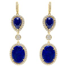 Blue Lapis Lazuli Cabochon Diamond Pave Halo Drop Dangle Yellow Gold Earrings 14 Karat Yellow Gold 2.00 CT Diamonds Genuine Blue Lapis Lazuli Cabochon Slices Important Information: Please note that this item will take 2-4 weeks to deliver - it is showcased overseas in one of our jewelry brand boutiques. If ordered we will recall it to our US office and once received, it will be inspected in every detail for quality control. Afterwards, we will send it out to your address with our insured parcel. Approximate time of delivery, handling & logistical transport is around 2-4 weeks. Please contact us with any questions or details regarding this item's delivery dates + possibility of rushing the delivery if requested. We are always happy to discuss any requests and any questions with you. Yellow Gold Earrings, Blue Lapis Lazuli, Blue Lapis, Jewelry Brand, Yellow Gold Earring, Boutique Brands, Quality Control, Pave Diamonds, Jewelry Branding