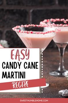 two glasses filled with candy cane martinis on top of a table