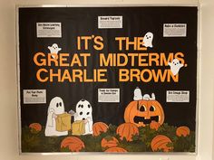 a bulletin board with ghost and pumpkins on it that says, it's the great midterms charlie brown