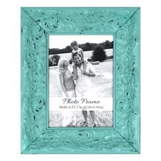 an ornate turquoise frame with the words photo frame on it