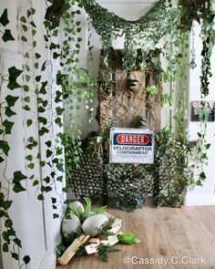 the entrance to an office decorated with ivy