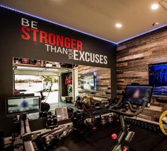 the inside of a gym with various exercise equipment