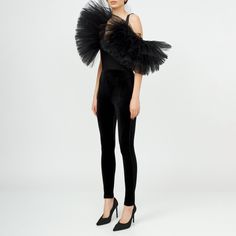 A fusion of contemporary and classic, this innovative bodysuit strikes the balance between bold and sophisticated, making it a show-stopping addition to any ensemble. The asymmetrical design adds a touch of avant-garde sophistication, while the whimsical tulle ruffles exude a playful charm, adding an artistic flair to the aesthetic. Intricate detailing showcases craftsmanship, giving this bodysuit a refined touch that's sure to turn heads. Perfect for special occasions or as a daring accent to y Elegant One-shoulder Evening Bodysuit, Elegant Fitted One-shoulder Bodysuit, Modern Stretch Party Bodysuit, Fitted Asymmetrical Evening Bodysuit, Modern Stretch Bodysuit For Party, Fitted Asymmetrical Bodysuit For Evening, Elegant One-shoulder Stretch Bodysuit, Elegant Fitted Asymmetrical Bodysuit, Elegant Fitted Bodysuit For Evening