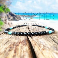 Men's Necklace - Surf Necklace - Surfer Style Necklace - Turquoise and Onyx Necklace - Beach Necklace - Black Gemstone Necklace - Tribal This necklace is made of black onyx and turquoise beads. It is handmade in a style suitable for summer and any other season. It is suitable for elegant, sporty or casual style of dress. Wonderful gift for loved ones and friends.   A great gift idea for Birthday, Christmas, Father's Day, Mother's Day, Thanksgiving or any other occasion. Bead size - diameter abou Black Natural Stones Jewelry For Beach, Black Spiritual Necklace For Beach, Black Spiritual Jewelry For The Beach, Spiritual Black Jewelry For Beach, Spiritual Black Jewelry For The Beach, Black Gemstone Necklace, Surf Necklace, Surfer Style, Beach Necklaces