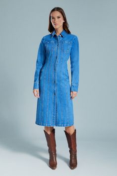 The Lorna Denim Shirt Dress serves forward-thinking style in a timeless-meets-modern cotton denim silhouette with contrast design stitching that shapes the body, a button-through front, standard collar, a front and back yoke and a back split movement. SIZING: True to size. AU: Model wears a size 8 / US: Model wears a size 4.FABRICATION: Main: 100% cotton - Midi length - Design stitching details - Back split Cotton Denim Dress With Snap Buttons For Work, Fitted Denim Dress With Snap Buttons For Workwear, Denim Workwear Dress With Snap Buttons, Denim Dress With Snap Buttons For Workwear, Workwear Denim Dress With Snap Buttons, Corsets Fashion, Denim Skirt Fashion, Contrast Design, Corset Shirt