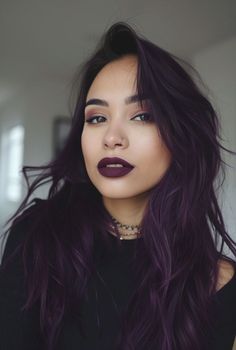 These purple hair color ideas offer many options for those looking to experiment with their hair, from subtle plum to vibrant violet. Makeup Ideas For Purple Hair, Plum Hair With Silver Highlights, Loreal Cool Amethyst Hair Color, Purple Halloween Hair, Rich Eggplant Hair Color, Purple Hue Hair, Overtone Purple On Brown Hair, Black Purple Hair Color, Makeup For Purple Hair