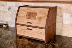 a wooden box sitting on top of a counter