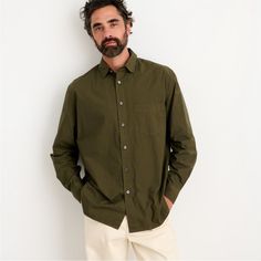 As The Name Implies, Alex Mill's Best-Selling Shirt Is Incredibly Easy To Wear With A Slightly Oversized Fit. Made In Alex Mill's Signature Garment-Dyed Paper Poplin That's Both Lightweight And Crisp. Has A Way Of Looking Even Better The More Rumpled Up It Is (Again, Easy). We Love It Over Jeans, Half-Tucked Into Chinos, Or Layered Under Sweaters And Blazers. Solid Olive Green Color. Point Collar. Button Front Closure. Button Cuff Sleeves. Single Chest Pocket. Back Yoke. Intentionally Oversized Fit. Stretch Cotton Poplin Fabrication. Color: Military Olive Size Small Measures Flat Approximately: 22.25" Pit To Pit, 32" Long In Back 98% Bci Cotton / 2% Elastane Machine Washable **B Casual Long Sleeve Dress Shirt For Everyday, Casual Dress Shirt With Relaxed Fit For Everyday, Casual Relaxed Fit Dress Shirt For Everyday, Casual Long Sleeve Poplin Top, Casual Everyday Collared Dress Shirt, Classic Unstructured Khaki Shirt, Khaki Cotton Shirt With Spread Collar, Casual Cotton Dress Shirt With Pockets, Green Cotton Business Casual Shirt