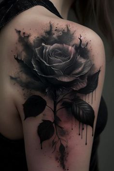 a woman's shoulder with a black rose tattoo on her left arm, and dripping paint