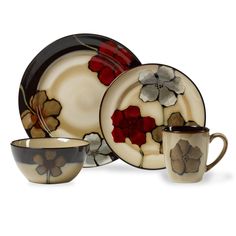 a set of dinnerware with flowers painted on it