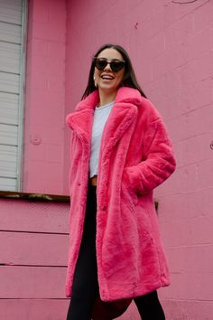 Fall nights can get a little chilly, so make sure to grab a fluffy coat like our Zoey Coat to keep you stylish and warm! She features an oversized fit, three big button closure up the the front, two side pockets, and soft warm material! Throw her over any outfit to add a little warmth! FINAL SALE. Hot Pink Fluffy Jacket, Pink Fluffy Jacket, Cozy Oversized Pink Outerwear, Pink Fur Coat For Cold Weather, Pink Fluffy Coat, Hot Pink Fluffy Coat, Pink Fluffy Winter Outerwear, Pink Winter Coat, Fluffy Jacket