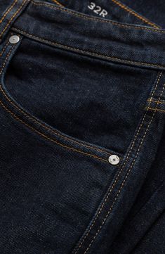 Dark-washed Italian denim with a peck of stretch means all-day comfort and style in these versatile straight-leg jeans. 32" inseam Zip fly with button closure Five-pocket style 98% cotton, 2% elastane Machine wash, line dry Imported Classic Jeans With Button Closure And Straight Hem, Classic Jeans With Button Closure, Classic Straight Hem Jeans With Button Closure, Classic Tapered Leg Jeans With Button Zip Fly, Classic Dark Wash Cropped Jeans, Classic Jeans With Button Closure In Rigid Denim, Classic Rigid Denim Jeans With Button Closure, Classic Straight Leg Jeans With Button Zip Fly, Classic Relaxed Fit Jeans With Button Closure