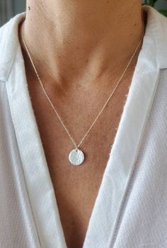 "This dainty minimalist necklace set is so simple and elegant. You can wear them together or separately. The necklaces are completely separate and made in lengths 3 inches apart to stagger them appropriately. Shown in photos in 16\"/ 19\" lengths. You can also personalize each disk with either an initial or a zodiac symbol for no extra charge. Perfect for a mothers necklace! All items are handmade with high quality gold fill or sterling silver materials so they won't tarnish or discolor. You can Minimalist Tiny Charm Necklaces For Everyday, Minimalist White Sterling Silver Necklace, Elegant Silver Hammered Charm Necklaces, Minimalist Silver Hammered Charm Necklaces, Tiny Pendant Charm Necklace In Minimalist Style, Elegant Silver Hammered Charm Necklace, Tiny Minimalist Pendant Charm Necklace, Minimalist Pendant Charm Necklace, Minimalist Tiny Pendant Charm Necklace