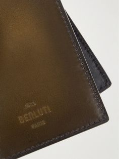 Berluti believes that practical accessories should be elegant too – that's why the brand employs so much time in the fabrics and finishes of its range. This billfold wallet is crafted from glossy Venezia leather and opens to reveal three card slots and two sleeves to keep notes and receipts organised. Luxury Brown Card Holder With Coin Pocket, Luxury Evening Trifold Wallet, Luxury Trifold Wallet For Evening, Elegant Leather Trifold Wallet For Formal Occasions, Luxury Brown Wallet With Interior Card Slots, Luxury Leather Trifold Wallet For Evening, Luxury Evening Wallet With Leather Lining, Luxury Business Wallets With Card Slots, Luxury Brown Trifold Wallet With Coin Pocket