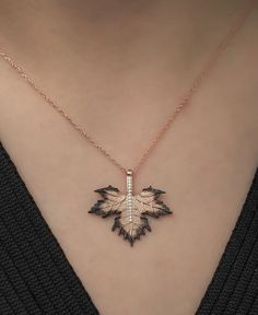 Produced from 925 sterling silver, the Sycamore Leaf Necklace elegantly reflects the power and beauty of nature. This necklace, which combines the symbolic meaning of the sycamore leaf with modern design details, is specially designed for strong and original women. Leaf details shaped with fine workmanship combine with the brilliance of silver to create a natural glow on your neck. This necklace, which is an ideal choice to complement your daily elegance or to add a touch inspired by nature to y Nature-inspired Sterling Silver Necklace For Anniversary, Sterling Silver Nature-inspired Necklace For Anniversary, Nature-inspired Sterling Silver Necklace, Silver Necklace Diamond, Sterling Silver Leaf Necklace, Leaf Necklace Silver, Sycamore Leaf, Silver Maple Leaf, Name Necklace Gold