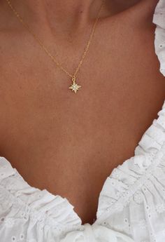 Gold Star Necklace | Small Star Necklace | Dainty Celestial Necklace | North Star Necklace | Constellation Jewelry | Layering Necklace DETAILS: * PENDANT is Gold Plated with Cubic Zirconia, measuring 12.5 mm x 14.5 mm * CHAIN is 14k Gold Filled * CLASP is 14k Gold Filled Model is wearing a 16 inch chain GOLD PLATED CARE: * Always remove jewelry before swimming, bathing, doing household chores, or using abrasive cleaners. * Apply beauty products such as perfume, hairspray or deodorant before wear Jewelry Layering Necklace, Gold Star Necklace, Constellation Jewelry, Jewelry Layering, North Star Necklace, Star Necklace Gold, Sparkle Necklace, Gold Pendant Jewelry, Celestial Necklace