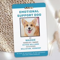 a dog id card with an image of a corgi on it's front