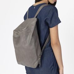 This stunning backpack is made of genuine soft sovage leather in a Gray color. With enough room for all your daily essentials, It is perfect for everyday use, as well as for laptops of most sizes,  IPAD, A4 files, books and travel. it as a unique structured  with a zipper closer at the top, and two sides zipper pockets for mobile, keys, etc.It is fully lined with black strong cotton fabric which I divide to two large interior, zip pocket, and a leather cell phone pocket,  shoulder strap is adjus Leather School Bag, Leather Phone Pouch, Laptop Backpack Women, Leather Hip Bag, Large Leather Bag, Leather Laptop Backpack, Brown Leather Backpack, Backpack Laptop, Leather Backpack Purse