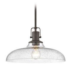 a large glass light fixture with an industrial style bulb on the top and one light hanging from