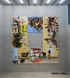 an art installation with multiple pictures on the wall