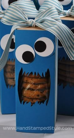 two boxes with cookies in the shape of cookie monster