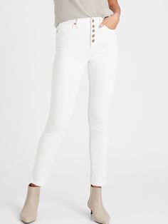 SLIM FIT: Our version of the cigarette jean, these have a skinny fit from hip to knee, and a slim leg that’s a little wider than a skinny leg.  4-WAY STRETCH: Advanced bi-stretch denim, engineered with 4-way stretch for a holds-you-in feeling that' Fitted White Cropped Jeans For Fall, White High Rise Stretch Cropped Jeans, White Stretch High Rise Cropped Jeans, White Stretch Jeans For Everyday, White Fitted Straight Jeans, White Fitted Casual Jeggings, Fitted Straight Leg Jeggings With Five Pockets, White High Rise Fitted Cropped Jeans, White Fitted High Rise Cropped Jeans