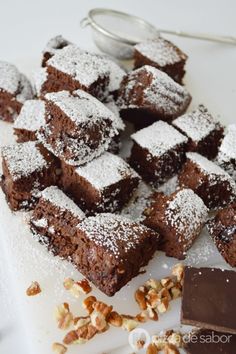 chocolate desserts and nuts on a cutting board