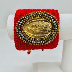 Artisan Hand Crafted - Embroidered Virgen De Guadalupe Cuff Bracelet Note: This Listing Is For Quantity One (1) Cuff Bracelet As Shown In Picture #1 With The Virgen De Guadalupe Pendant. This Product Was Artisan Made. It Was Thoughtfully Crafted By The Skilled Artisans Of Indigenous Communities Around The World Where Weaving, Crocheting, And Beading Make Up A Large Part Of Their Daily Life, Especially For Women. These Indigenous Communities Produce Millions Of High-Quality Artisan Products Every Bohemian Style Red Cuff Bracelet As Gift, Red Woven Jewelry For Festival, Embroidered Festival Bracelet, Red Embroidered Jewelry For Festival, Bohemian Red Cuff Bracelet As Gift, Red Woven Bracelets For Festival, Red Bohemian Cuff Bracelet As Gift, Red Embroidered Festival Jewelry, Virgencita Bracelet