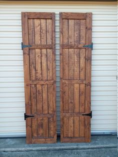 two wooden doors sitting next to each other