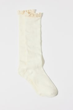 Cozy waffle knit socks in a tall knee high silhouette trimmed with ruffles. Features Waffle knit knee high socks Ultra-soft knee highs Topped with ruffle trim Knee-high length Content + Care 98% Cotton, 2% spandex Machine wash Imported Size + Fit Knee-high sock length Fits US women’s shoe size 6–10 | Waffle Knit Knee High Sock in Ivory, Women's at Urban Outfitters Lacy Socks, Pale White Skin, Knee Highs, Men's Shoes Accessories, Soft Sock, Thigh High Socks, High Knees, Long Socks, Knee Socks