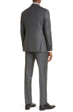 Textured virgin-wool sharkskin construction defines a modern, stylish suit framed by bold notched lapels. Jacket has notched lapels; four-button cuffs; chest welt pocket; front flap pockets; side vents Trousers have zip fly with hook-and-bar closure; front slant pockets; back button-welt pockets Jacket is lined; trousers are lined to the knee 100% wool Dry clean Imported Modern Business Suits With Flat Front, Modern Business Suit With Flat Front, Modern Office Suits With Notch Lapel, Tailored Three-piece Suit With Pressed Crease For Business Meetings, Modern Wool Suits For Business, Modern Wool Business Suits, Tailored Three-piece Suit For Business Meetings, Modern Suits With Concealed Placket And Lapel Collar, Modern Suits With Pressed Crease In Suiting Fabric