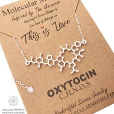 "This beautiful solid sterling silver Oxytocin necklace is my artistic representation of the Oxytocin Molecule. When we hug, kiss or even hold a loved one's hand, oxytocin levels increase. Due to this, it has been called \"the love hormone.\" In fact, the hormone plays a huge role in all pair bonding. The hormone is greatly stimulated during birth, breastfeeding, and physical intimacy. This pendant makes a great \"I Love You\" gift. This is a copyrighted Molecular Motifs original design. You won Love Hormone, Obgyn Gift, Molecule Necklace, Science Jewelry, Physical Intimacy, Science Themes, Science Gifts, Art Carte, Necklace Love