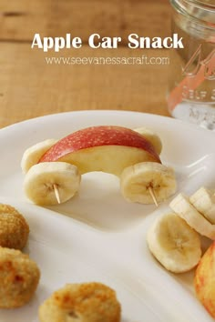 an apple and banana snack on a white plate