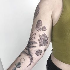 a woman with a tattoo on her arm