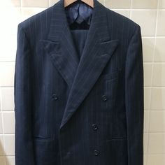 For Sale Is A Vintage 100% Wool Double-Breasted Suit With Peak Lapels From The 1930s Or The 1940s Based On The Union Label, In A Handsome Dark Grey Chalk Stripe Fabric! With Trousers And Coat, A Perfect Suit For Any Occasion! Sold As-Is, Feel Free To Ask Questions, Make An Offer And It's Yours! Thanks For Looking! Elegant Pinstripe Double-breasted Suit With Double Button, Classic Striped Double-breasted Suit, Classic Double-breasted Pinstripe Suit, Tailored Striped Suit With Double-breasted Fastening, Classic Pinstripe Suit With Double-breasted Button Fastening, Stripe Fabric, The Union, Double Breasted Suit, Striped Fabrics